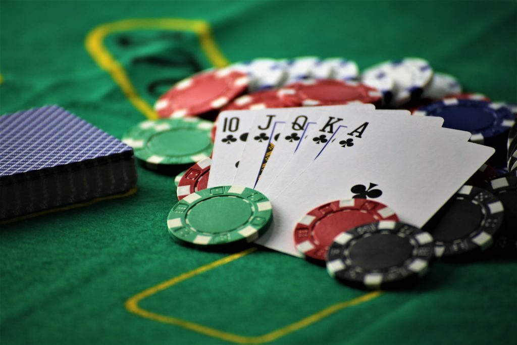 poker hand, chips and table